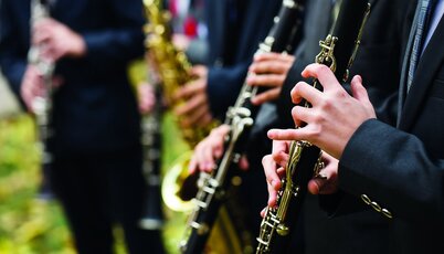 group of musicians playing the clarinet.