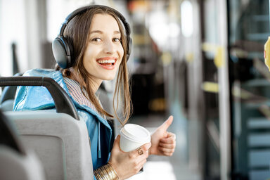 Female passenger using public transport