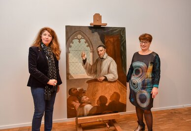 Le tableau Saint-Vincent de Paul restauré Le tableau Saint-Vincent de Paul restauré, présenté par Laurence Lamy, Conservateur du Musée d'Agesci, et Elisabeth Maillard, vice-présidente de l'Agglo en charge de la culture et du patrimoine historique